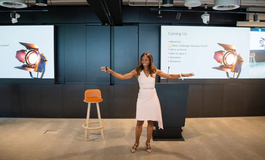 Caroline Flanagan delivering a corporate presentation on career progression for Black professionals